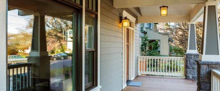 remodeled house exterior, a front porch with a welcoming ambiance